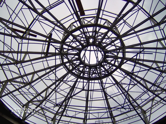 Radial steel roof structure photographed during construction in Brașov
